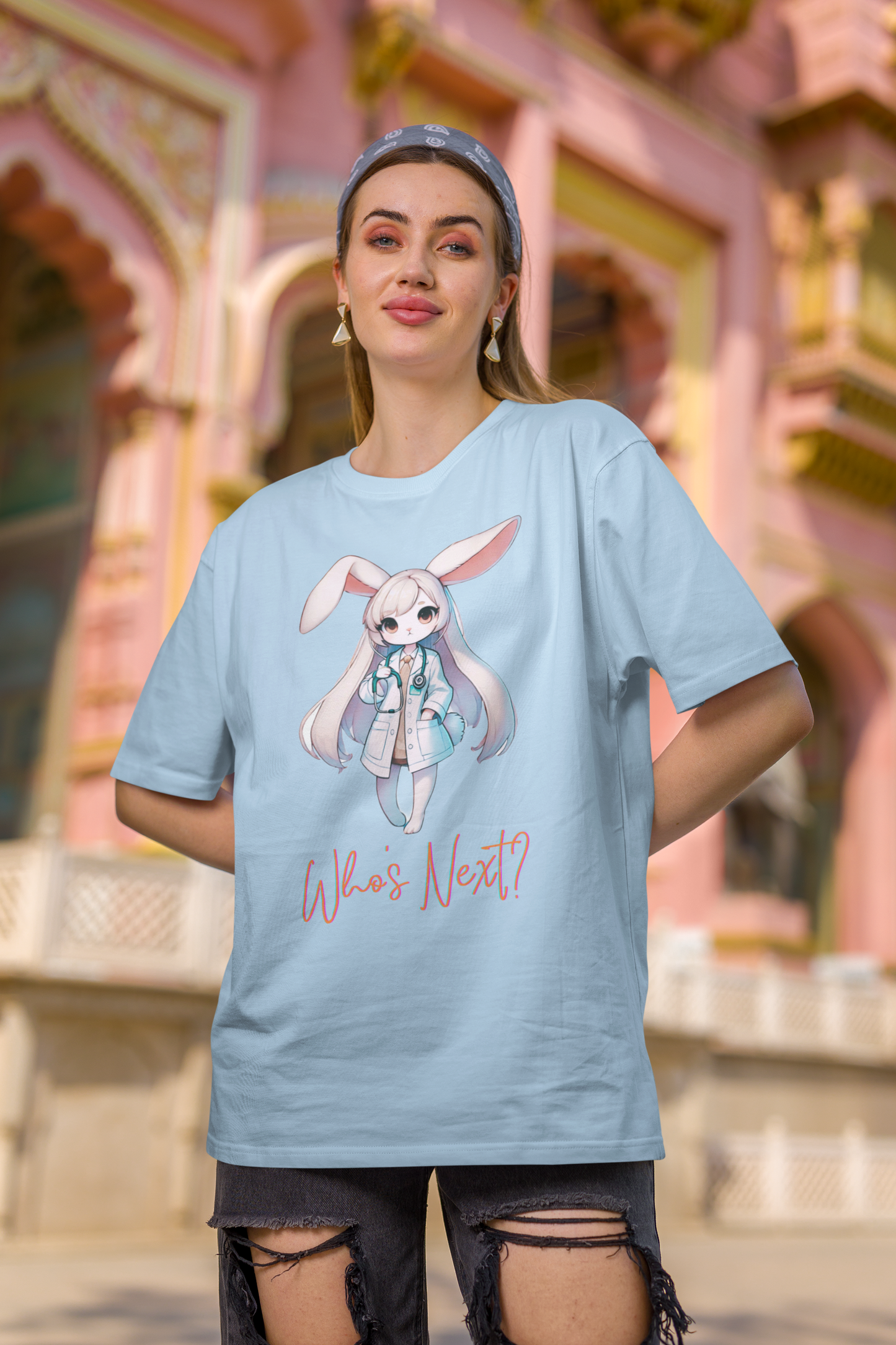 Women's heavy cotton T-shirt featuring a cute rabbit doctor holding a stethoscope